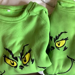 Pair Of Grinch Long Sleeve Green Sweatshirts, One Small And One Large