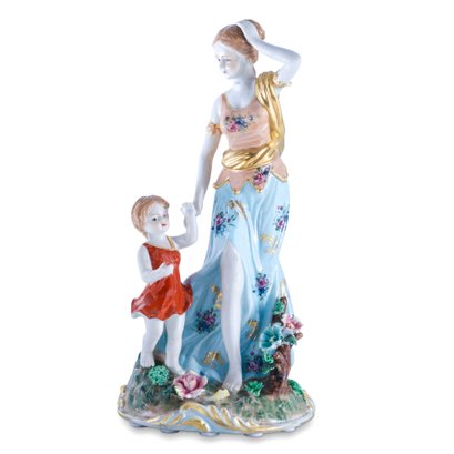 Artistic Elegance: An Exquisite Tale Of Motherly Love In Porcelain