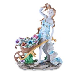 Blossoming Beauty: Woman Pushing Flowers Porcelain Figurine