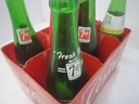 Coke Plastic Caddy And 6 Vintage Bottles