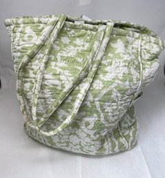 Green And White Blanket In A Bag