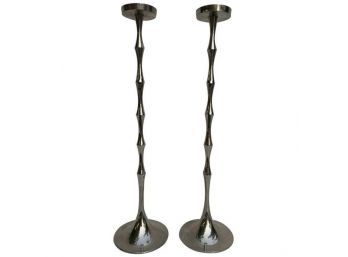 Tall & Sculptural Candle Holders In Stanless Steel