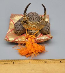 Samurai Replica Iron Helmet On Woven Pillow
