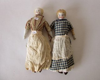 2 Antique Porcelain Head Dolls With Aprons