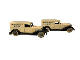 Two 1930s Tootsie Toy Dairy Trucks Original Paint And Wheels