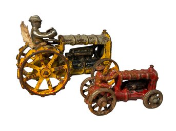 Two Antique Cast Iron Tractor Toys