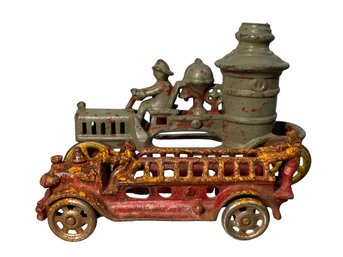 Two Antique Cast Iron Firetruck Toys
