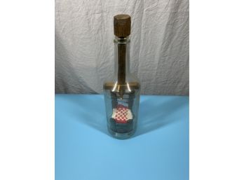 Vintage Wooden Chair In A Glass Bottle