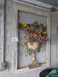 Painted Metal Wall Hanging Of An Urn Of Flowers.