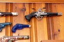 Collection Of Decorative Blown Glass Bottle Firearms
