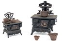 Pair Of Miniature Crescent Cast Iron Toy Stoves