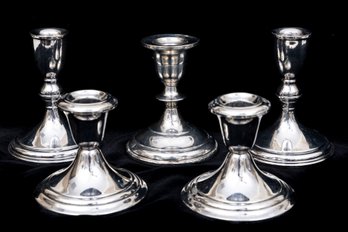 Five Weighted Sterling Silver Candlestick Holders