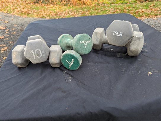 Collection Of Three Dumbbells