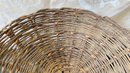 An Antique Woven Centerpiece Basket