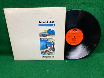 Level 42. Staring At The Sun On 1988 Polydor Records.