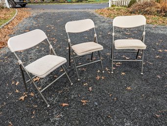 Collection Of Three Cosco Folding Chairs