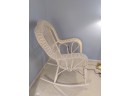 Vintage Wicker Arm Chair With Two Baby Blue Pillows