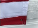 American Flag With Sewn Stars. Triple Stitched. Measures 3' X 5'. Excellent.