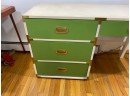 Vintage Mid Century 4-Drawer Desk With Lime Green Drawers And Gold Hardware.