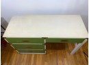 Vintage Mid Century 4-Drawer Desk With Lime Green Drawers And Gold Hardware.