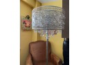 An Opulent Pierced Chrome And Crystal Standing Lamp