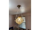 A Crystal And Brass Chandelier By ABC Carpet & Home