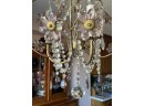 A Crystal And Brass Chandelier By ABC Carpet & Home