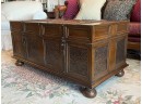 A Plantation Style Coffee Table Or Trunk With Tons Of Storage By Ashley Furniture