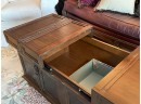 A Plantation Style Coffee Table Or Trunk With Tons Of Storage By Ashley Furniture