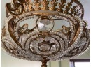 An Elegant Bronze And Crystal Chandelier From Horchow