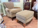 An Animal Print Chair And Ottoman By ABC Carpet & Home