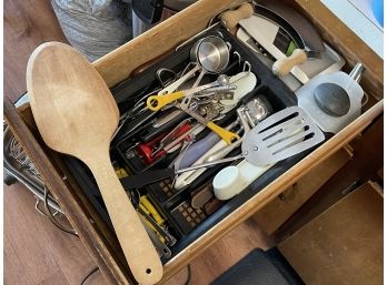 A Drawer Of Kitchen Utensils And Implements