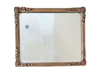Decorative Wall Mirror With Scrolling And Floral Corner Motifs