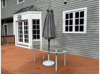 Brown Jordan Aluminum And Glass Oval Outdoor Dining Table And Umbrella Stand