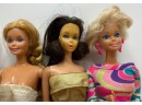 8 Vintage Barbie Dolls In Used Condition With Extra Clothing