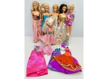 8 Vintage Barbie Dolls In Used Condition With Extra Clothing