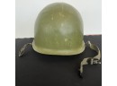 A Vintage US Army Metal Helmet With Strap -  11 X 9 X 7h
