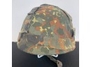 A Vintage US Army Metal Helmet With Cloth Camo Cover And Leather Liner - 55-57