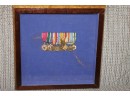 Unusual Display Of Miniature US Military Medal And Awards With Purple Heart In Shadow Box Frame