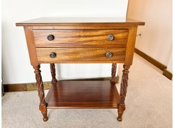 Two Drawer Nightstand With Foliate Form Legs.