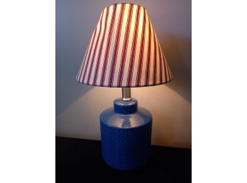Textured Blue Lamp With Red And White Shade