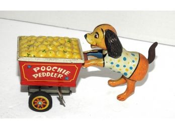1950s  Poochie Peddler Tin Litho Wind Up Toy