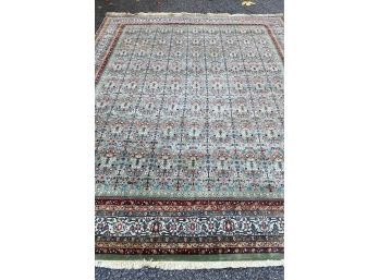 A Pretty Green, Cream, Blue, Pink & Black Area Rug With Fringe - 105'w X 144'long
