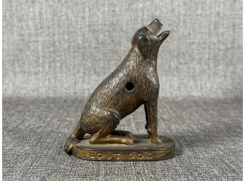 A Vintage Howling 'Lost Dog' Figure In Cast-Metal