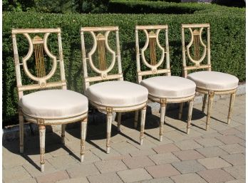 A Set Of 4 Painted Wood Gilt Trimmed Louis XVI Lyre Back Chairs