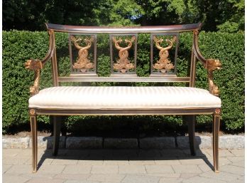 A Painted Wood Settee With Carved Gilt Dolphin Motif