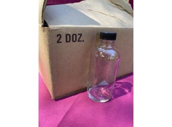 2 Cases Of 24 Little Bottles