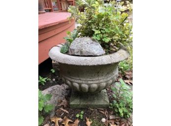 A Pair Of Footed Cement Garden Urns