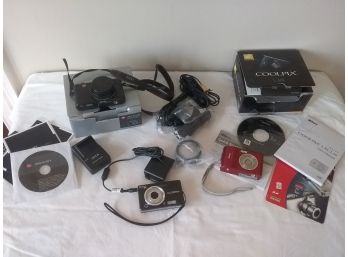 THREE CAMERAS With EXTRAs - Leica, Coolpix, Easy Share.....