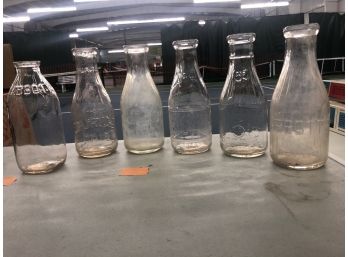 LOT OF 6 ONE QUART 1920S-1930S EMBOSSED MILK BOTTLES - HOLLY DAIRY - SHEFFIELD FARMS - PURITAN